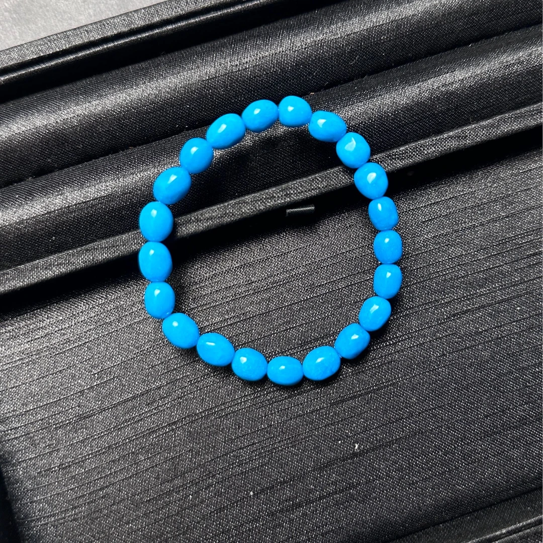 【米迦珠宝】8*6.5mm暴力蓝美国松随型绿松石手串