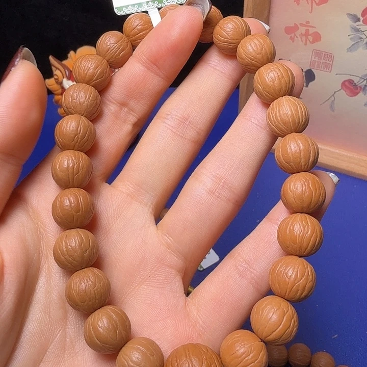 伪***装手串猴头核桃聚宝盆