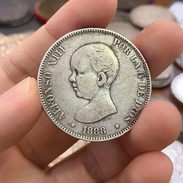 小***兴银Ag900如图一个银币