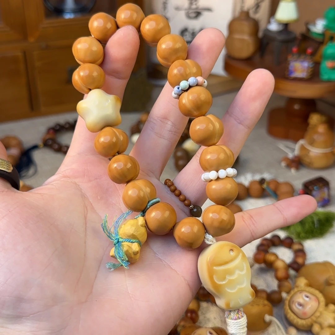 非洲檀香无事牌屁桃小鱼牙果手持