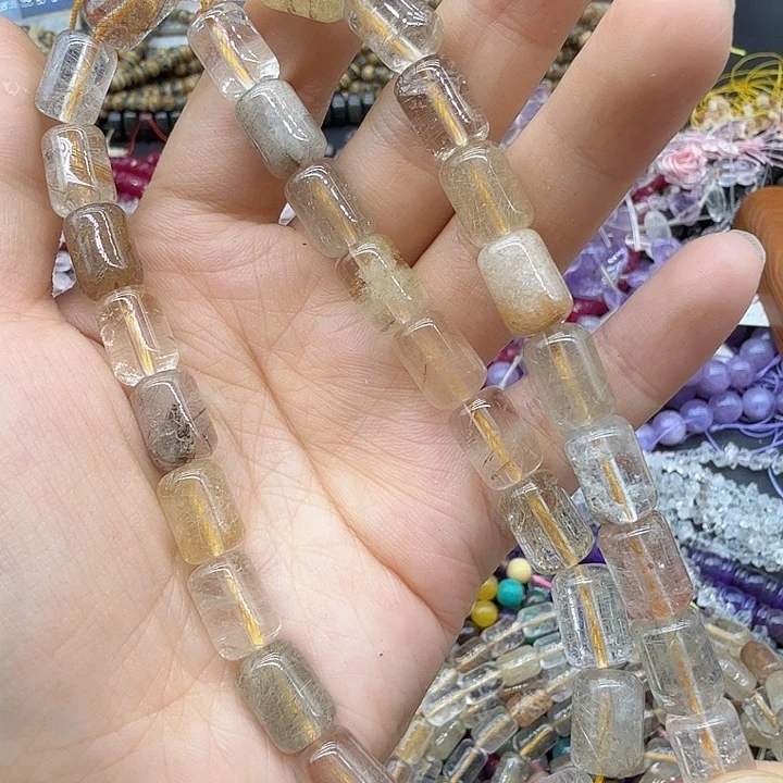 未镶嵌珠宝半成品水晶7×11彩发晶桶珠一条