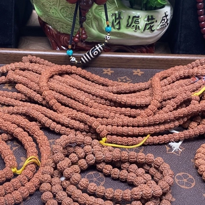 卧***紫金刚菩提吊坠108元皮老树王