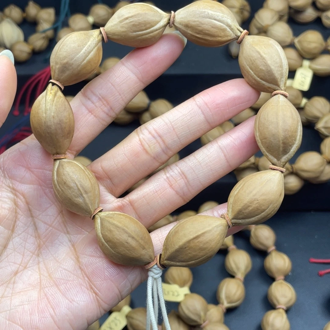 001橄榄核三花1.7