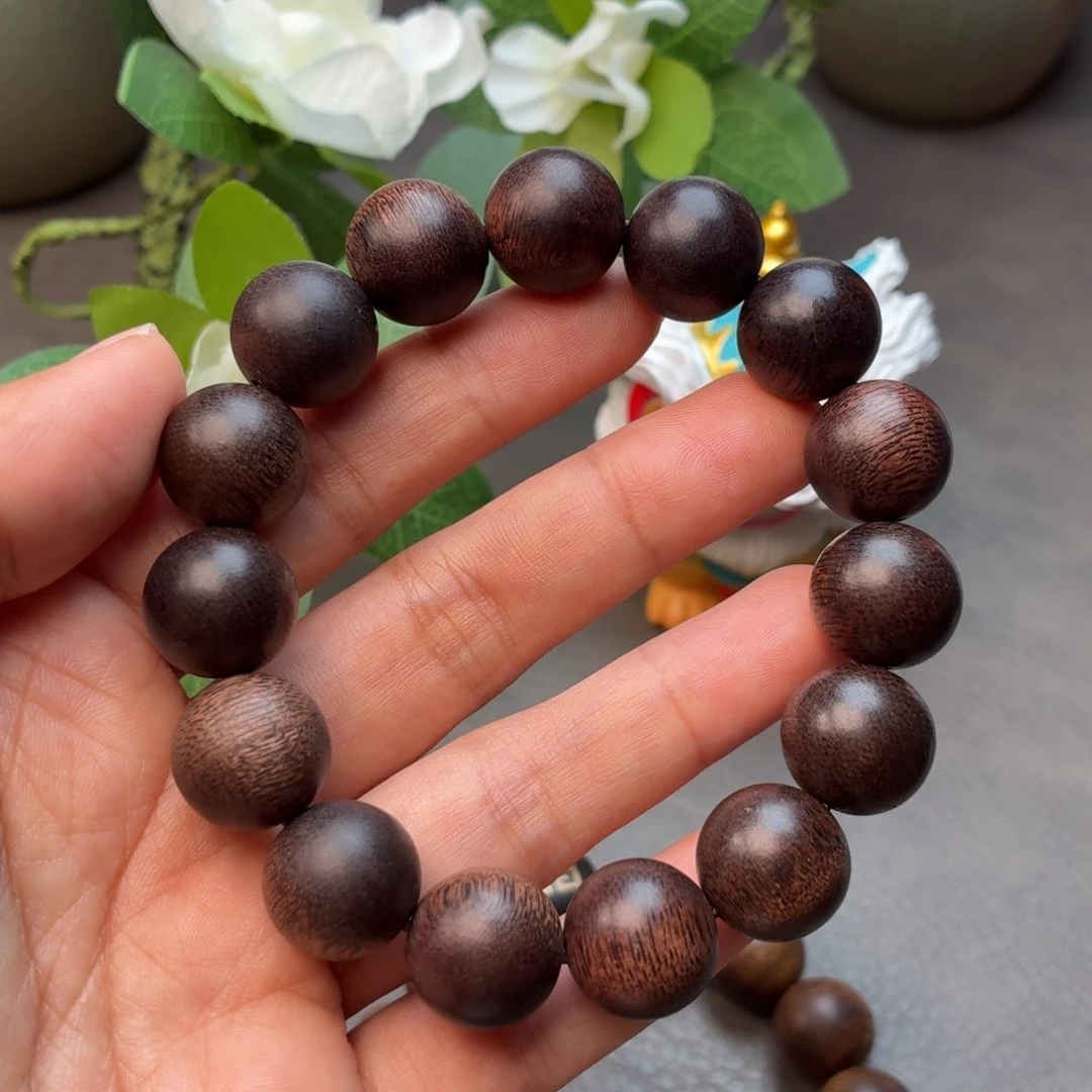 潇***生沉香碎屑沉香佛珠越南芽庄白奇楠瘤疤古董料1.4