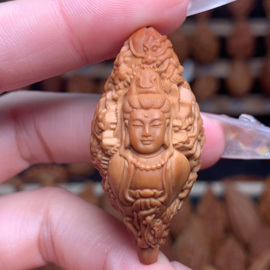 把件橄榄核九龙观音