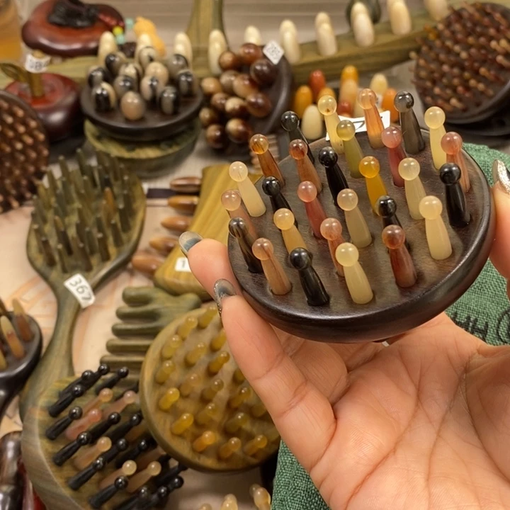 佳***嘉紫光檀羊角28齿按摩梳