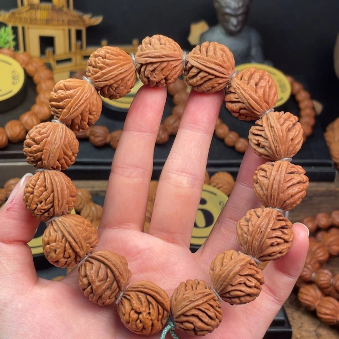 吊坠桃核刺龙纹21编织绳