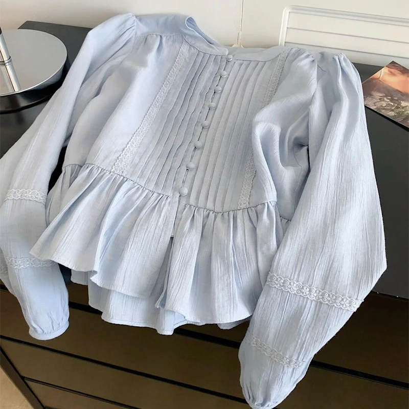 肌理感baby蓝色蕾丝拼接娃娃衫女早春2025年时尚新款挡摆长袖衬衫