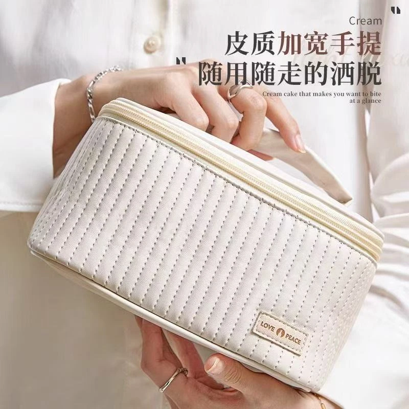 新款蛋糕化妆包大容量防水便携高级PU手提旅行化妆品收纳洗漱