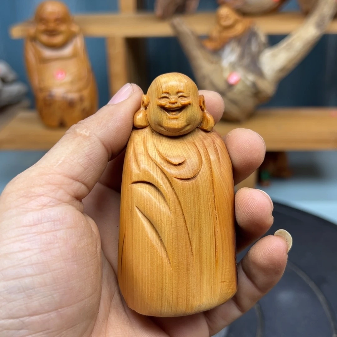 木q****晨崖柏木摆件手把件