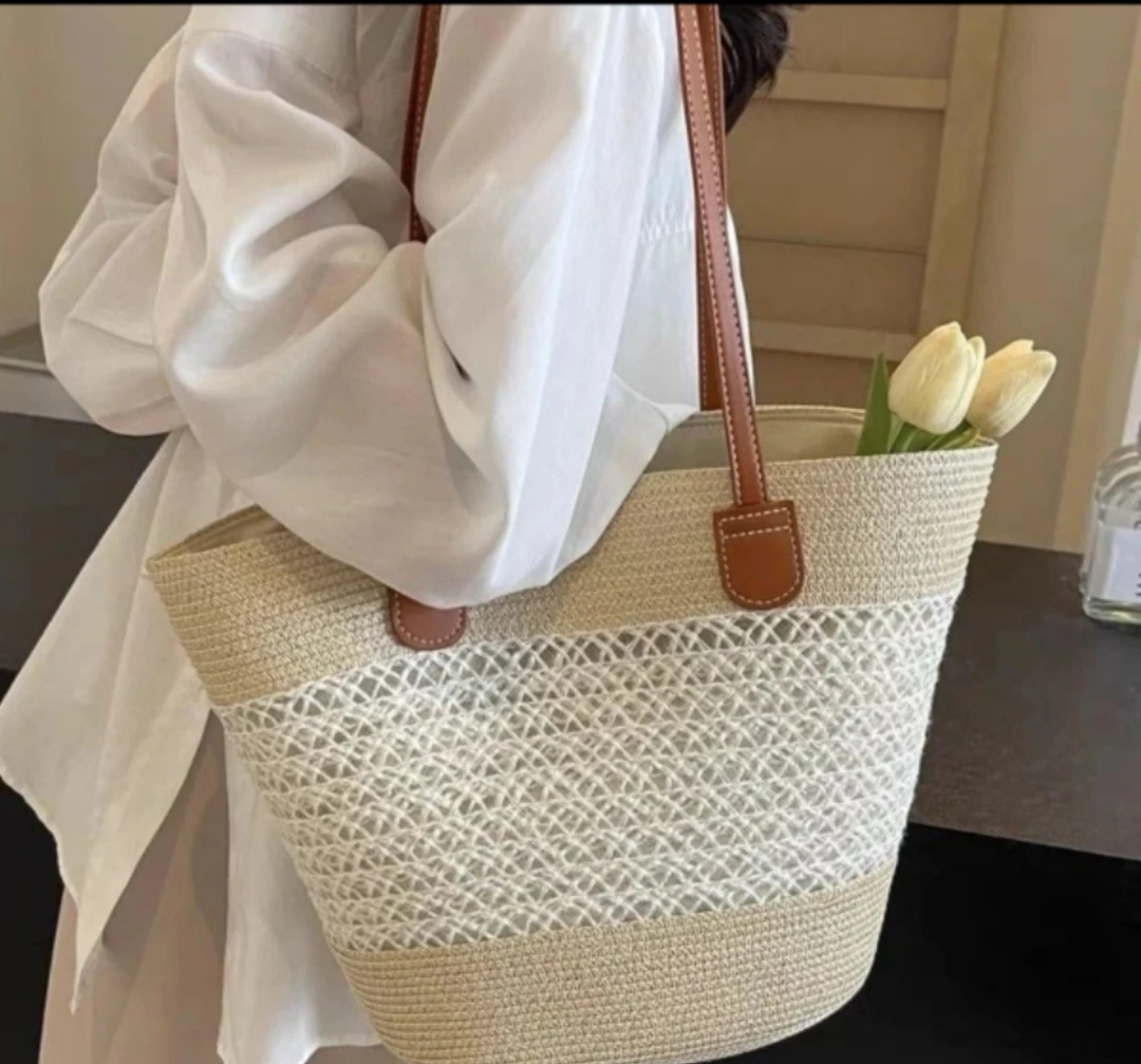 镂空编织草编包2025夏季新款通勤编制条纹单肩百搭时尚沙滩女包
