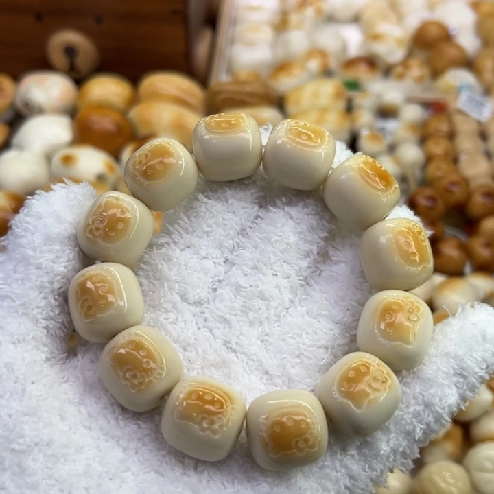 菩提根/象牙果把件59 象牙果原果雕刻炭烧kt 猫桶珠微瑕