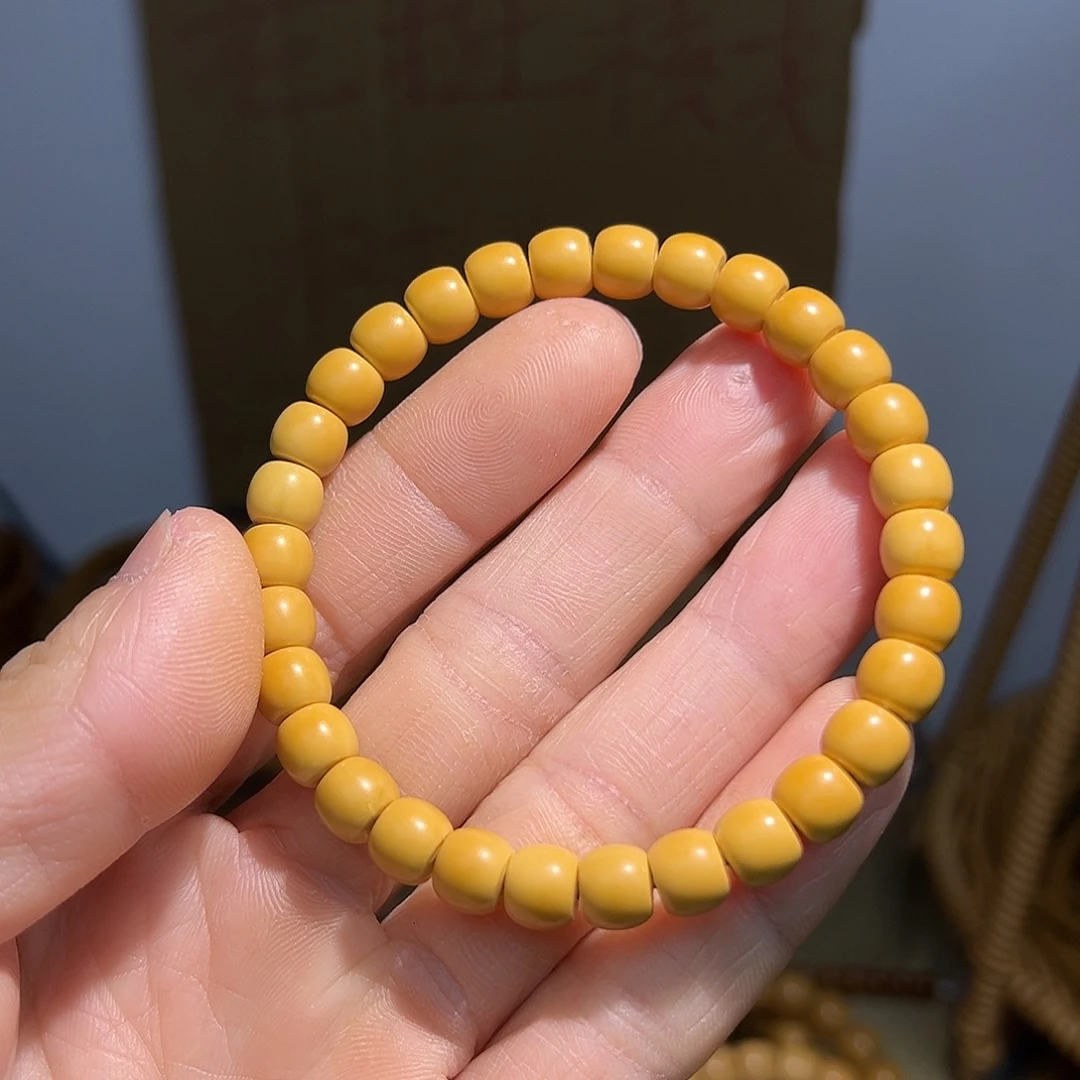 昵***称橄榄核手串老挝核尖单圈7.6