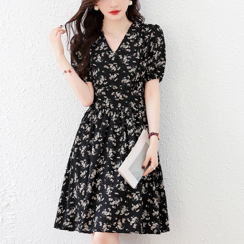 法式赫本风时尚小碎花拼接连衣裙2025夏季新款气质收腰显瘦小黑裙