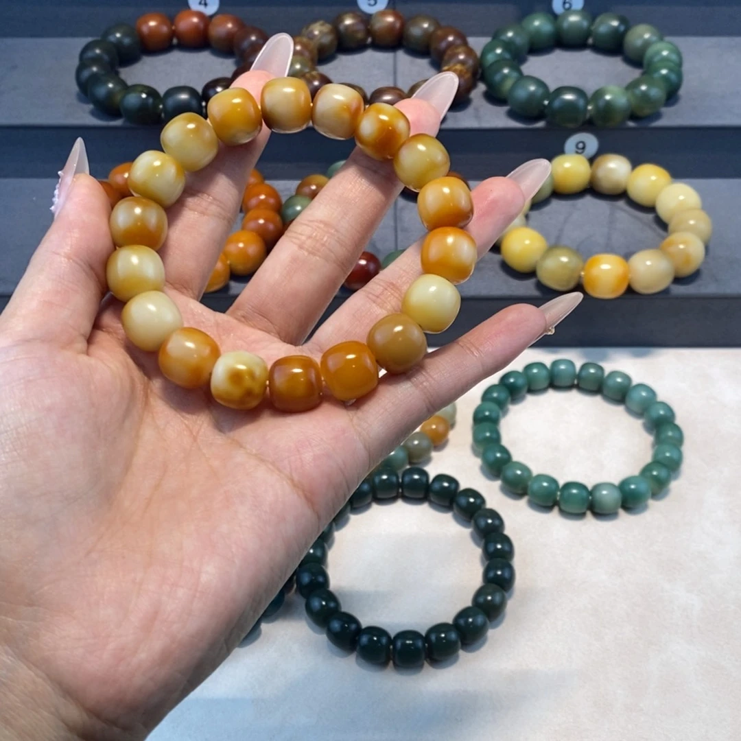 橘***M菩提根/象牙果手串