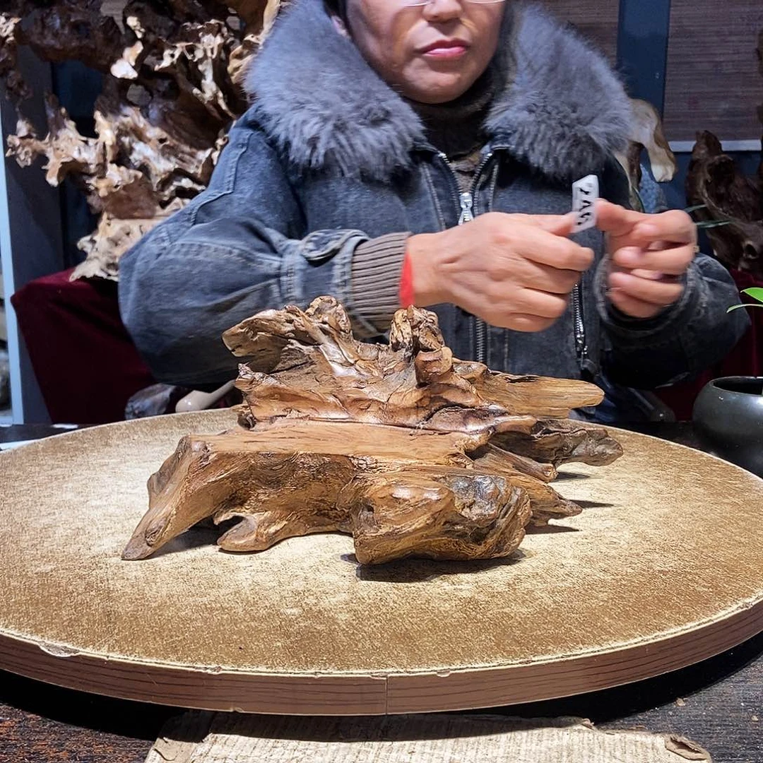 晓***芳246。株木随行根艺