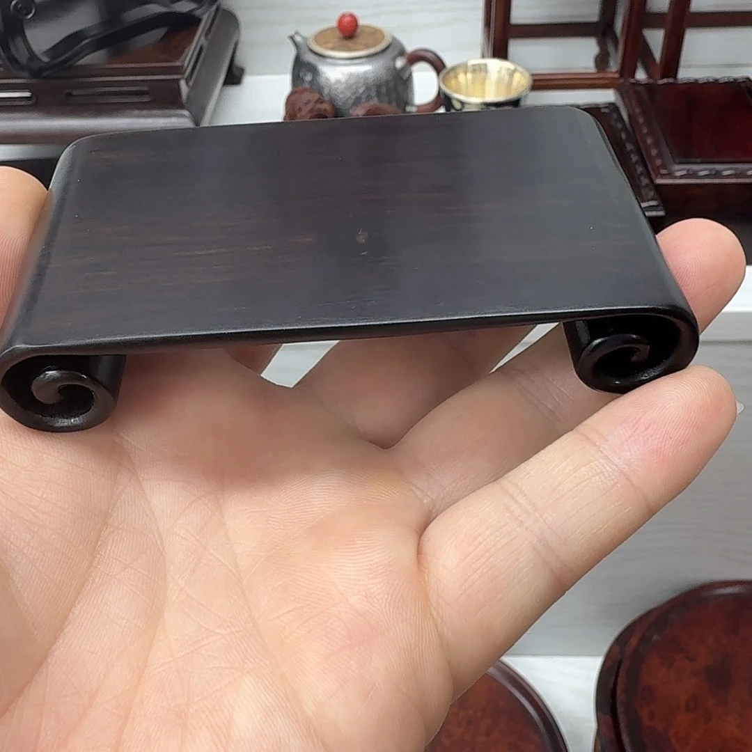 藤类紫光檀整木书卷底座