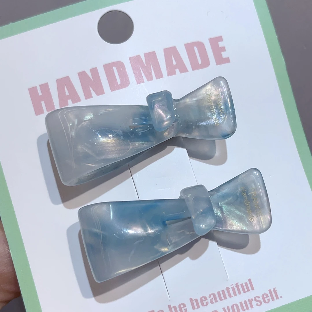 F412冰川蓝色蝴蝶结一对边夹