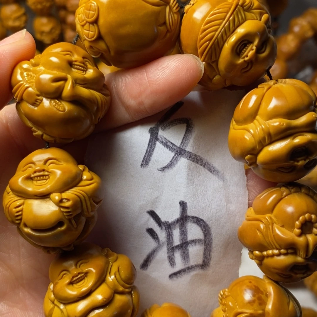 兆***辉手串/手链橄榄核上色弥勒精品