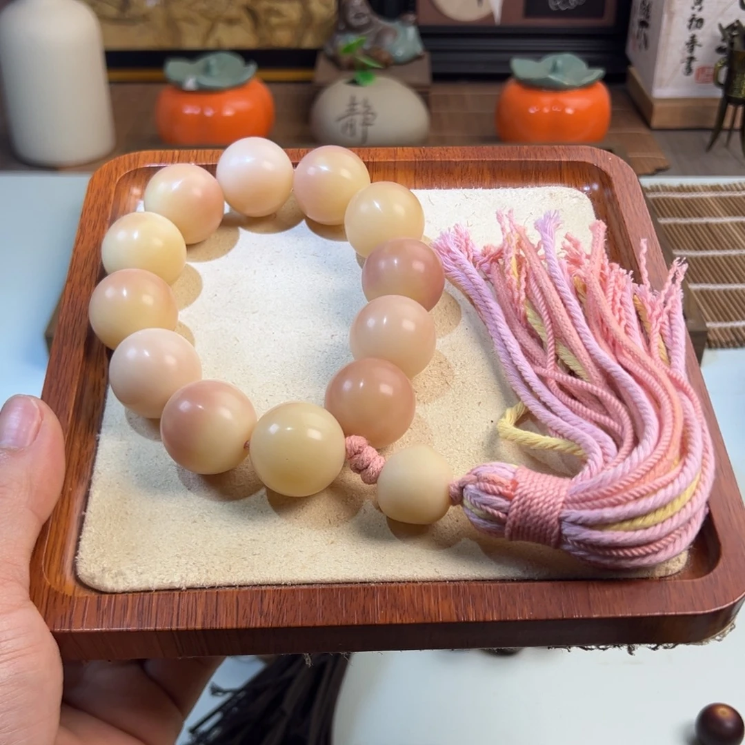 阳***笑吊坠菩提根/象牙果圆珠手持24mm