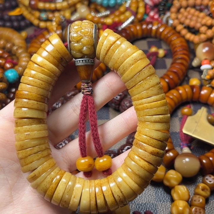 藏区牛牛材质手持