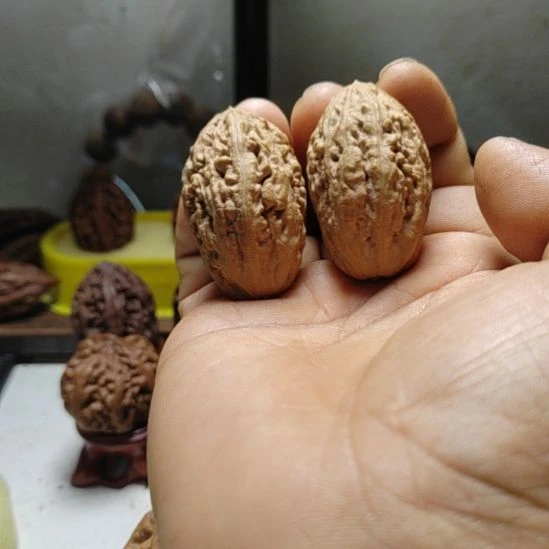 把件文玩核桃手捻金梭子