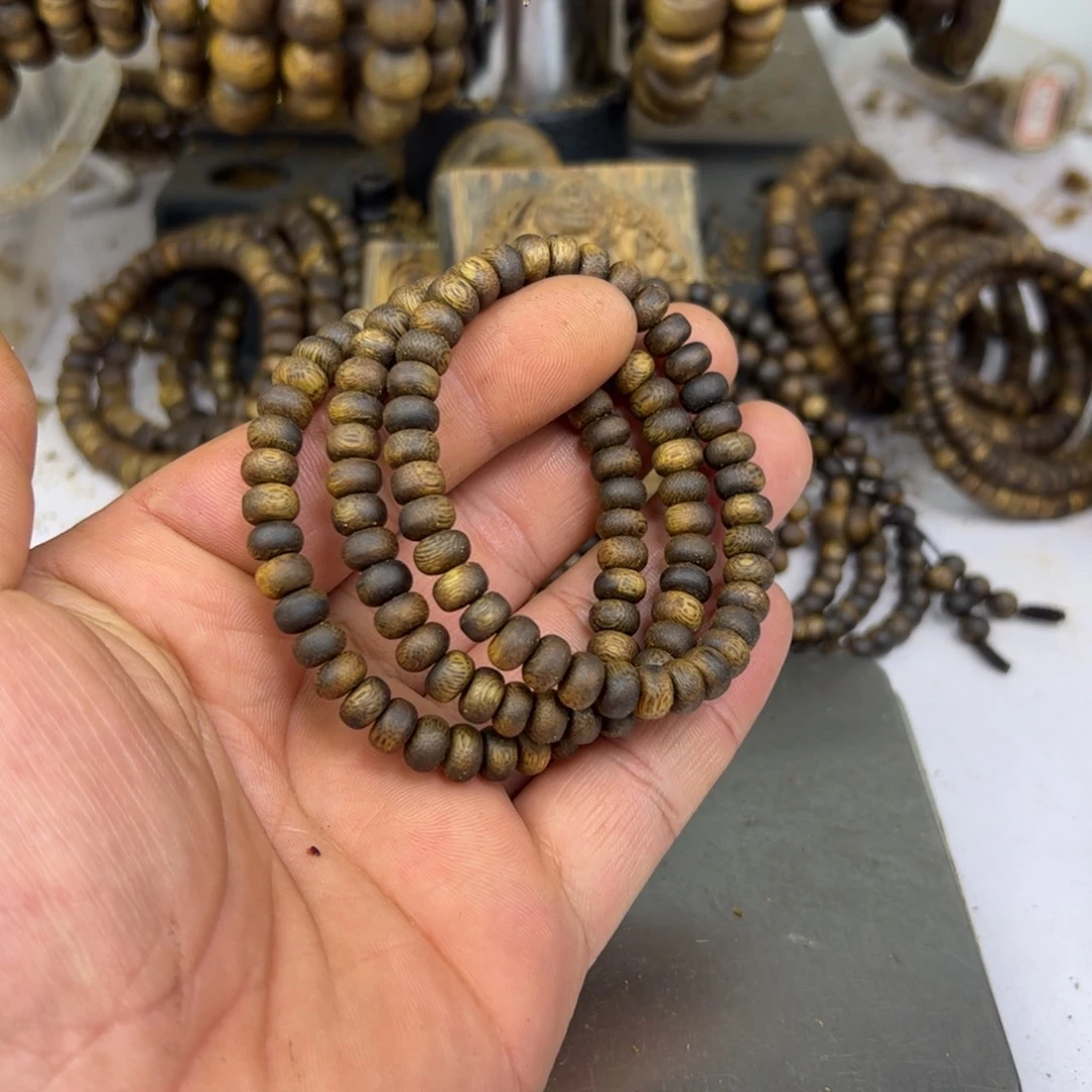 沉香奇楠沉香0.7mm99沉算盘珠3条