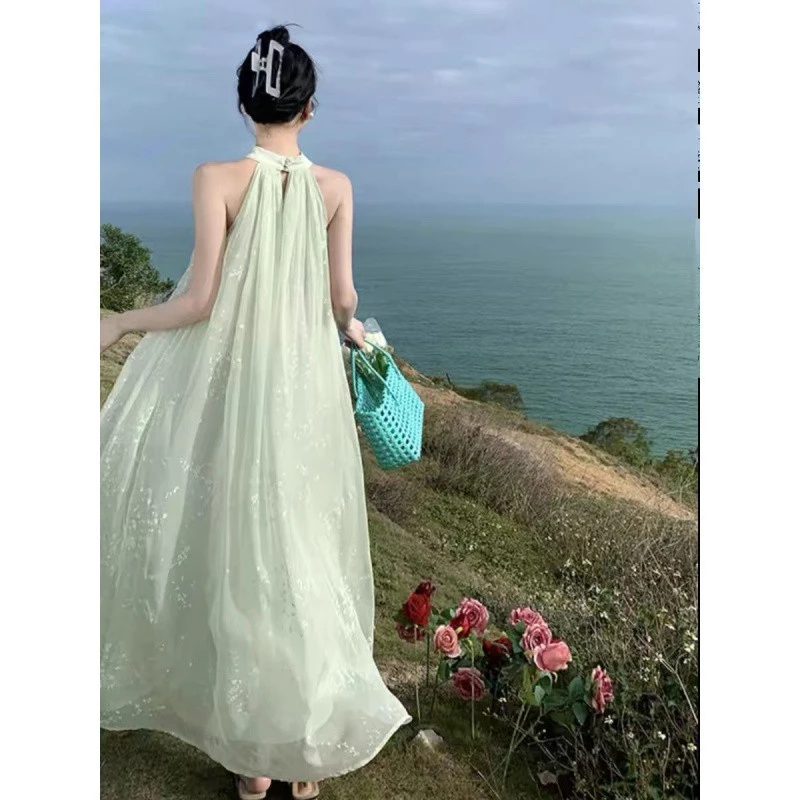国风旗袍改良宽松无袖绿色大摆裙女2025年夏季度假碎花雪纺连衣裙