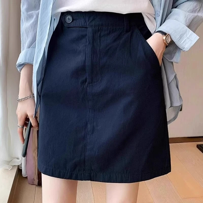 芯娇晴半身裙女夏新款简约通勤工装短裙气质显瘦包臀纽扣a字热裙