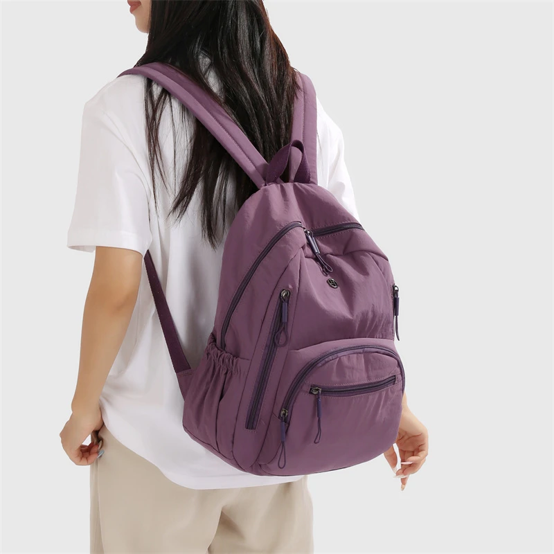 潮流大学生文艺风双肩包韩式休闲百搭旅游轻便防泼水男女同款背包