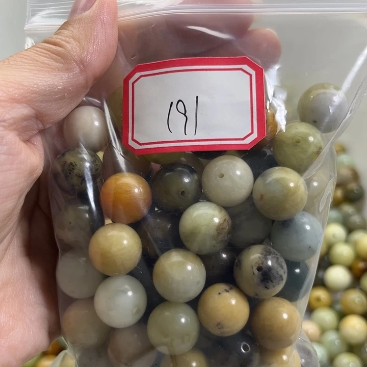 W***鲸足铂镶嵌蛇纹石玉手链