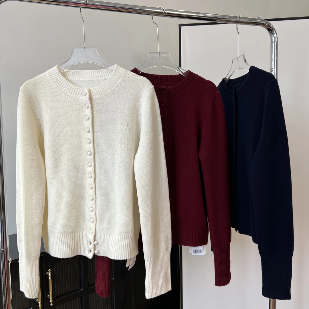 （新年毛衣）剥鳞羊毛春款休闲百搭包扣羊毛开衫