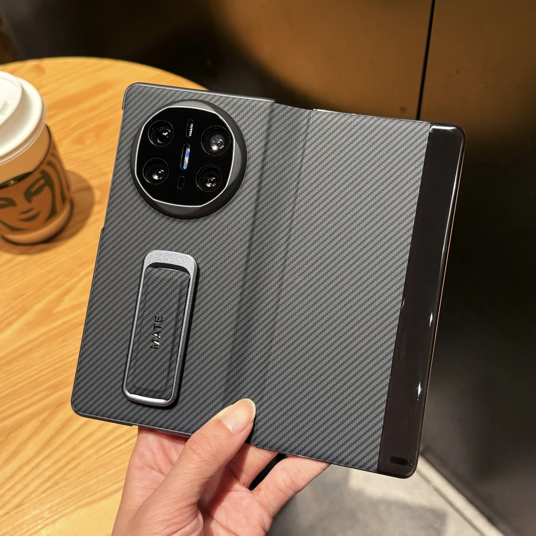 适用华为matex6手机壳新款腕带支架x5碳纤纹理高档商务皮套