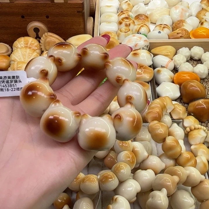 把件菩提根/象牙果1.3.44象牙果炭烤猫头微瑕