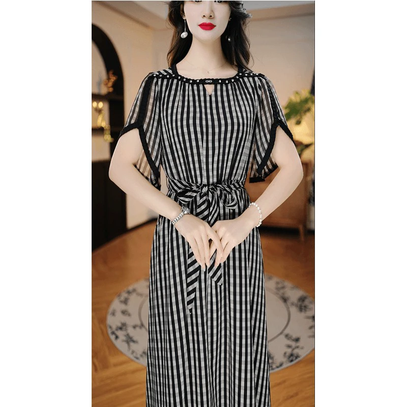 D426 2025年夏季新款遮肉显瘦修身时尚显气质轻奢女装宽松连衣裙