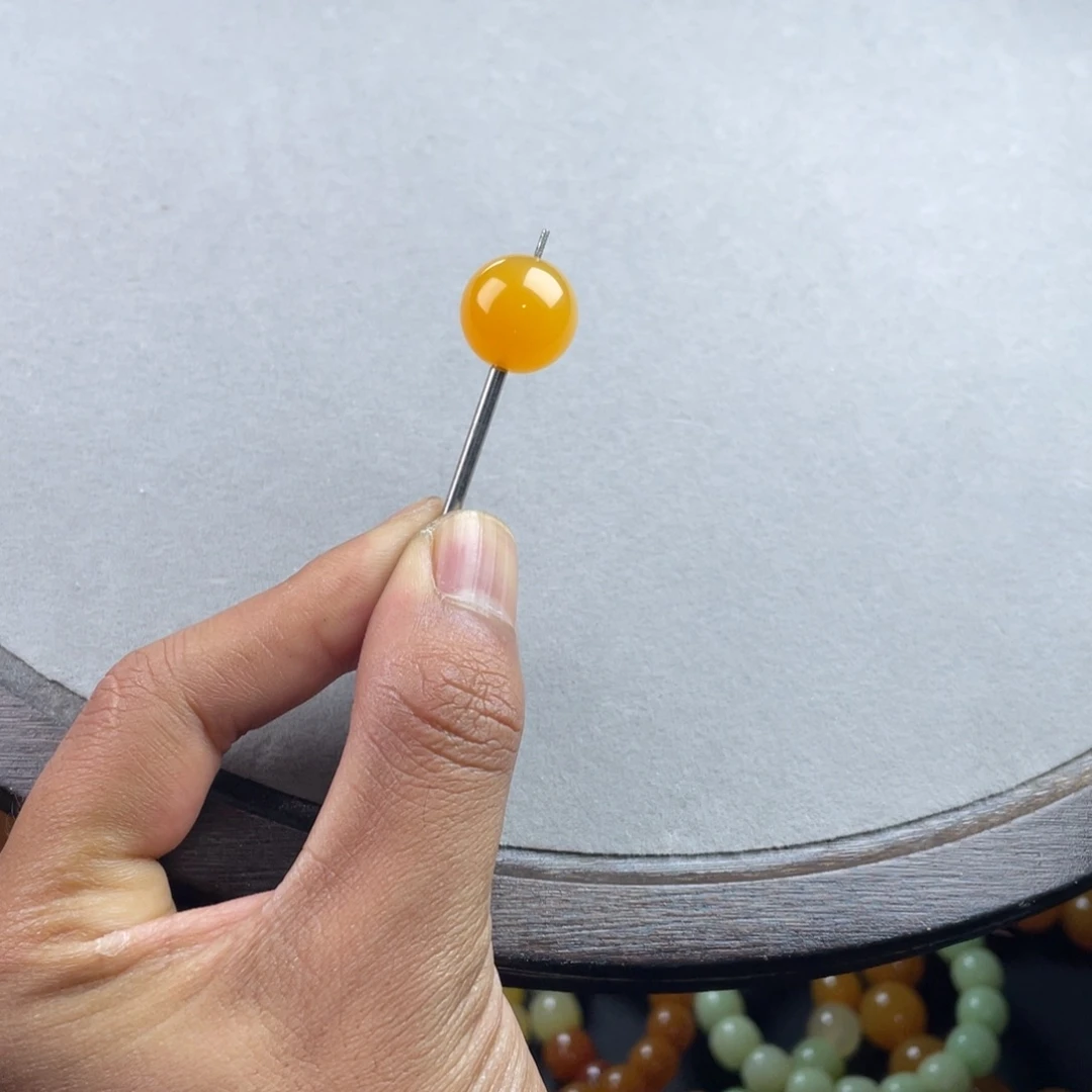 义***仔颈饰未镶嵌石英质玉（缅黄）