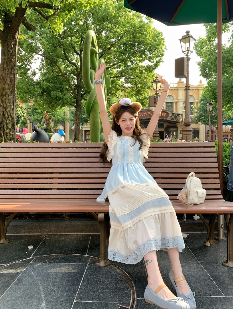 蓝色小飞袖蕾丝提花上衣拼接长款气质半裙套装