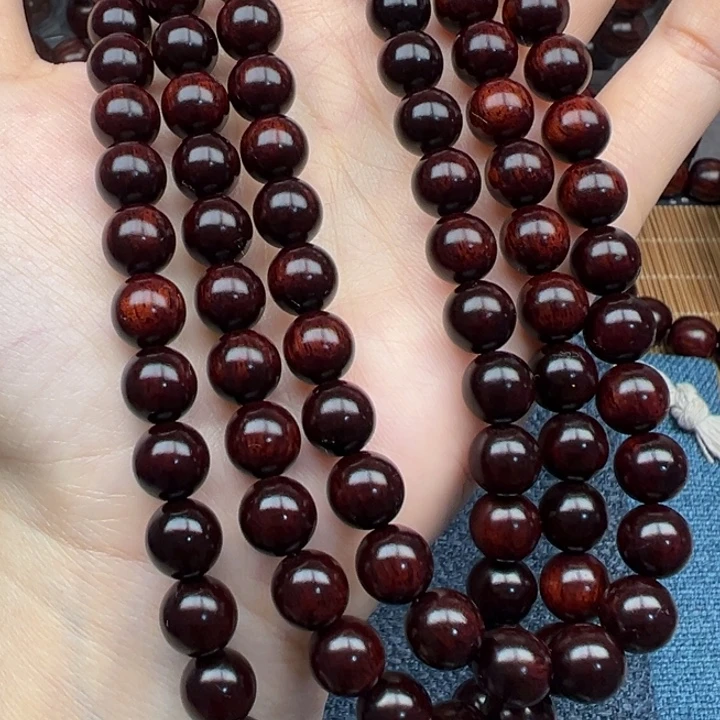 贺***本藤类海南红降树心油黑金08圆珠108颗