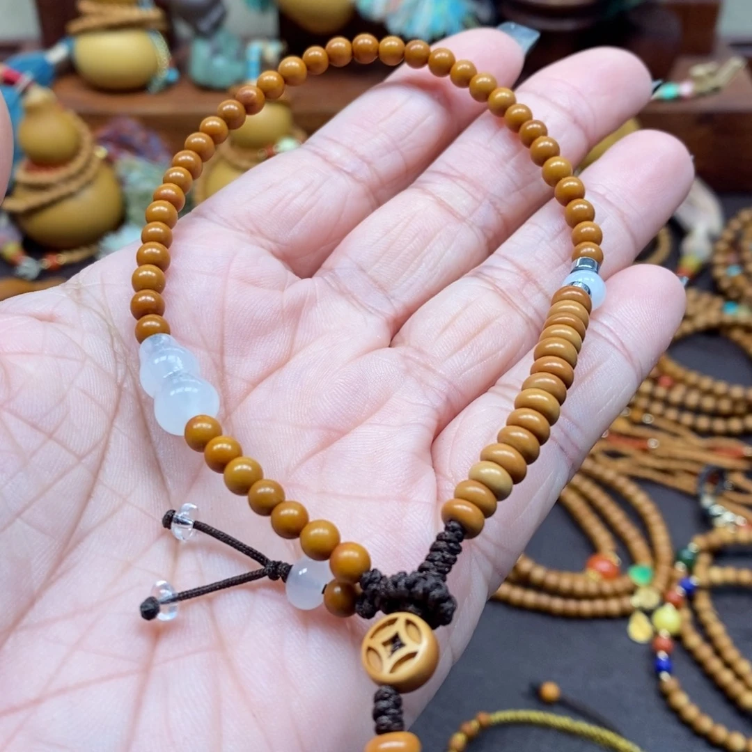 手工编织素串手机链一条