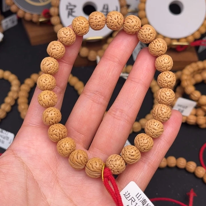 桃核手串山海经边尺10.5抛光尺寸误差0.5Ｍｍ之间