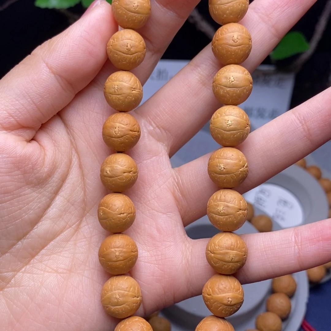 芥***米凤眼菩提吊坠12手串