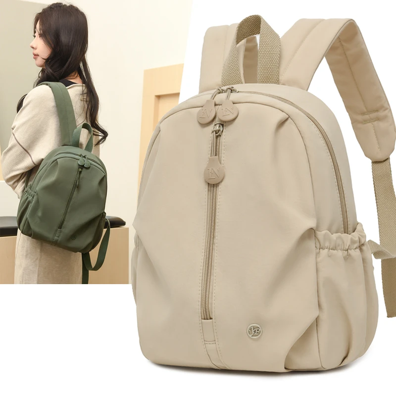 学生书包简约大容量百搭男女双肩包休闲旅行包通勤轻便背包登山包