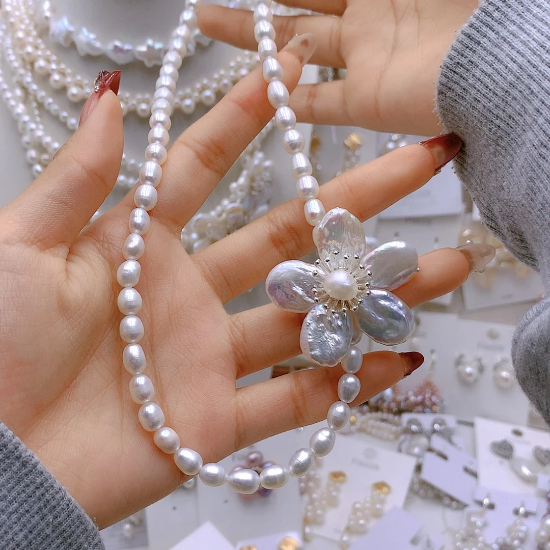 银S925镶嵌耳饰淡水珍珠氧*?