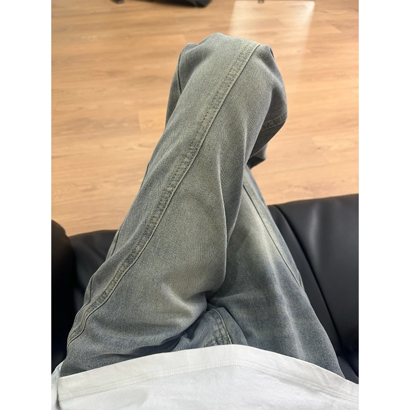 美式复古蓝斜切牛仔裤男款潮牌高级感vibe裤子显高显瘦拼接微喇裤