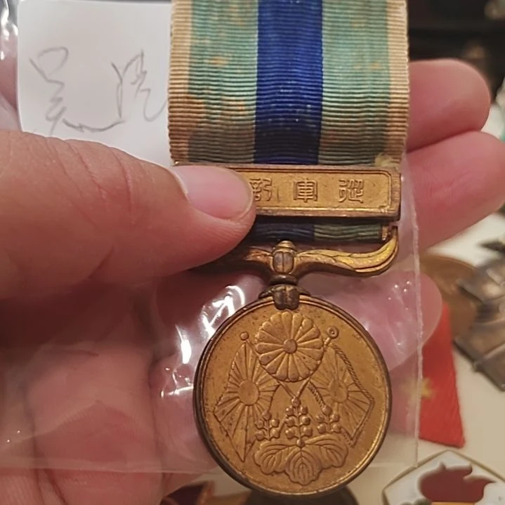 吴***风日本明治三十七八年纪念章