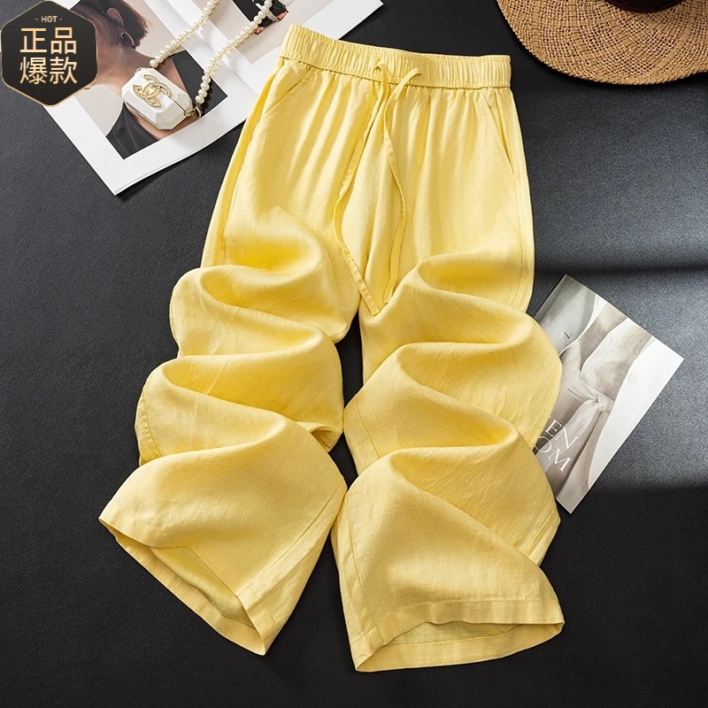 黄色亚麻裤子女2025新款夏季麻料垂感高腰山本裤莱赛尔九分棉麻裤