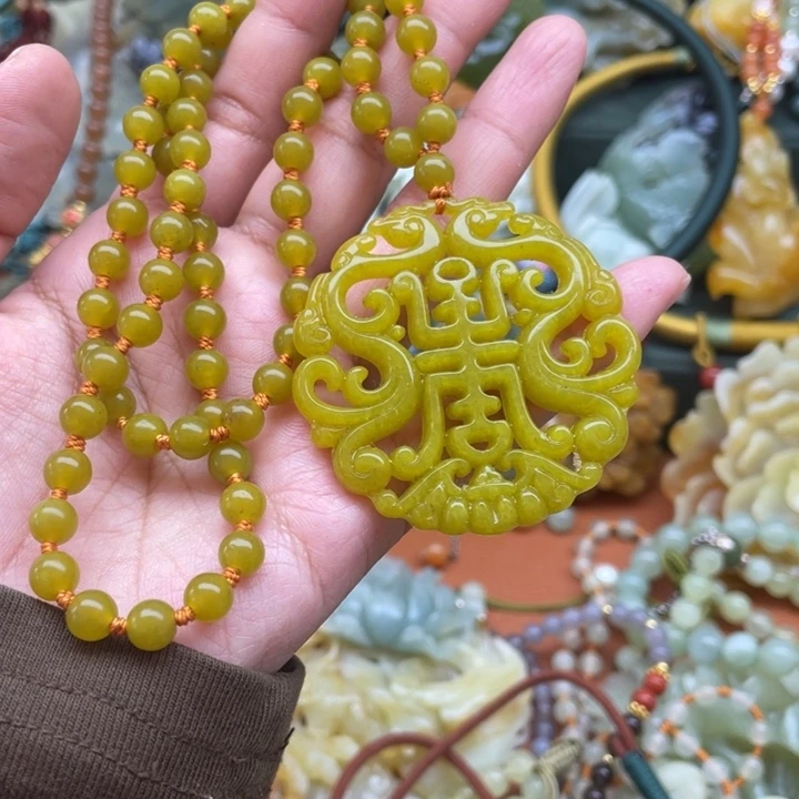 蛇纹石玉吊坠合金米****子