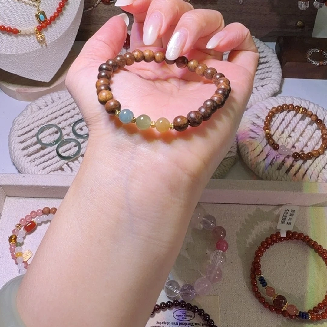 铜合金蓝水湖绿糖豆黑花梨手串默认微瑕