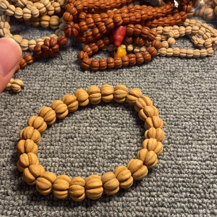 翼****文玩核桃吊坠14mm手串