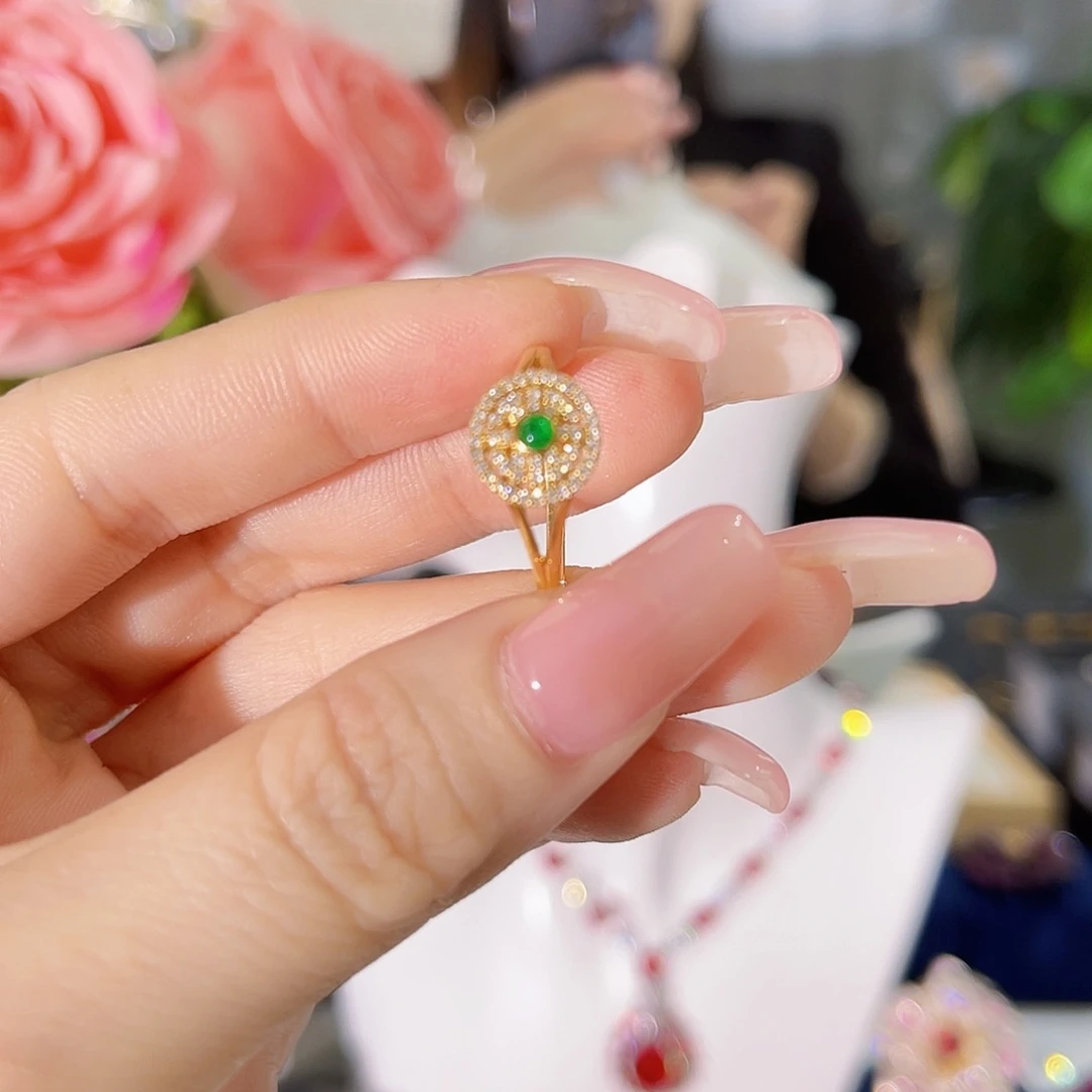 宁***海18K金镶嵌祖母绿戒指